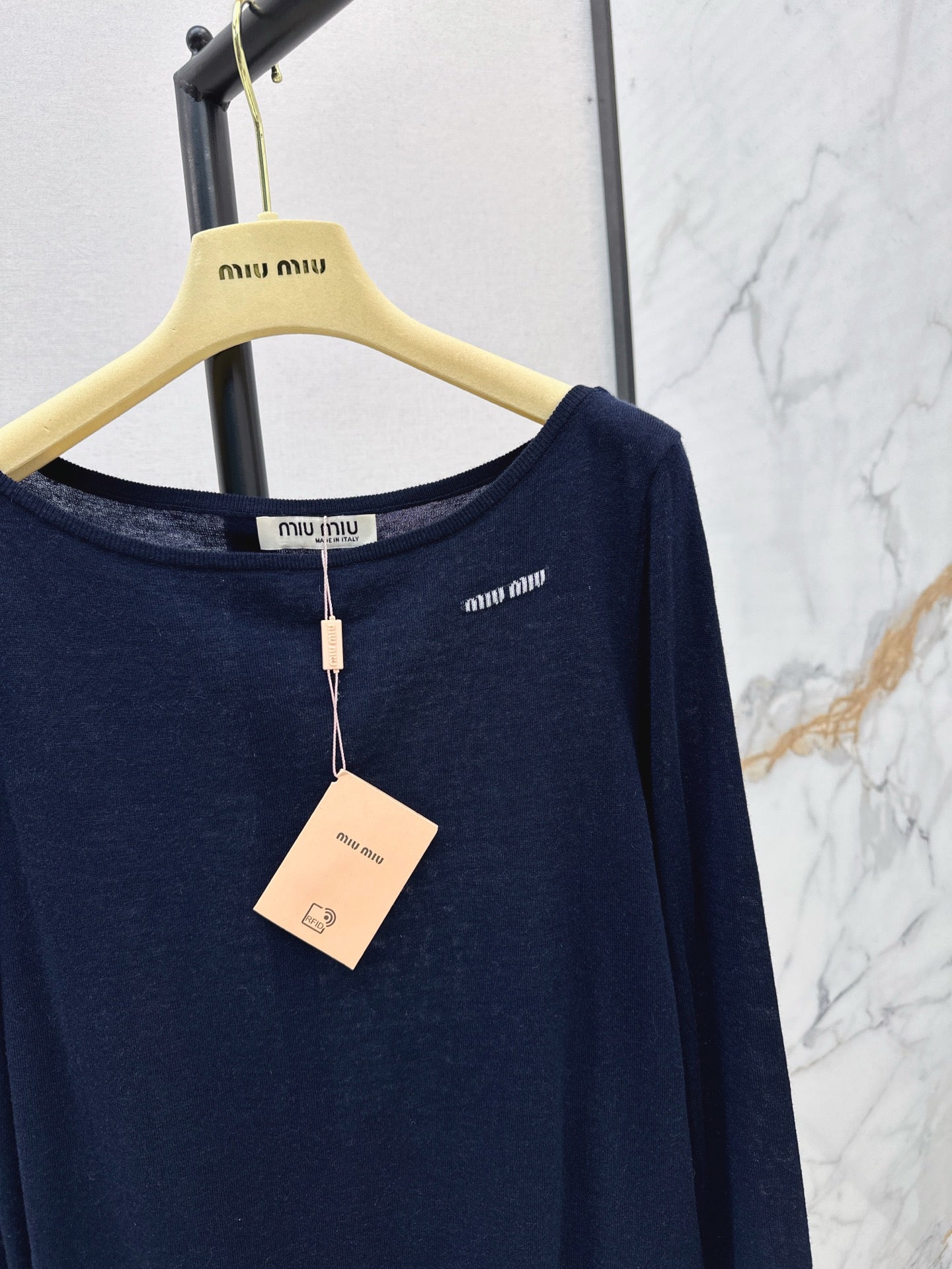 miu 25ss off neck sweater