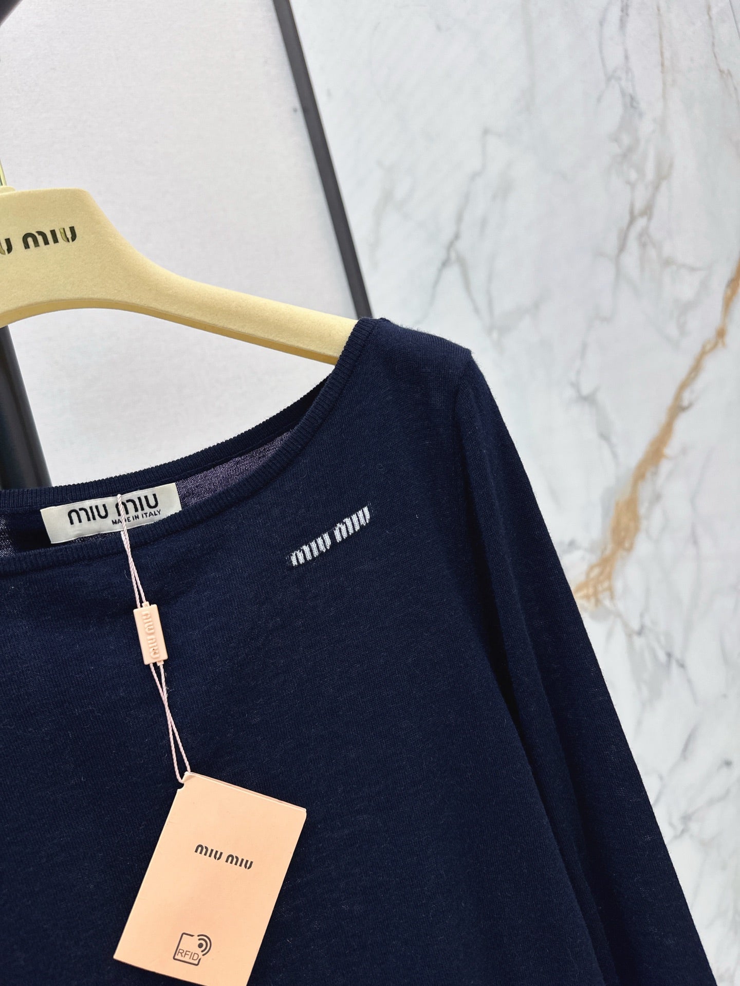 miu 25ss off neck sweater