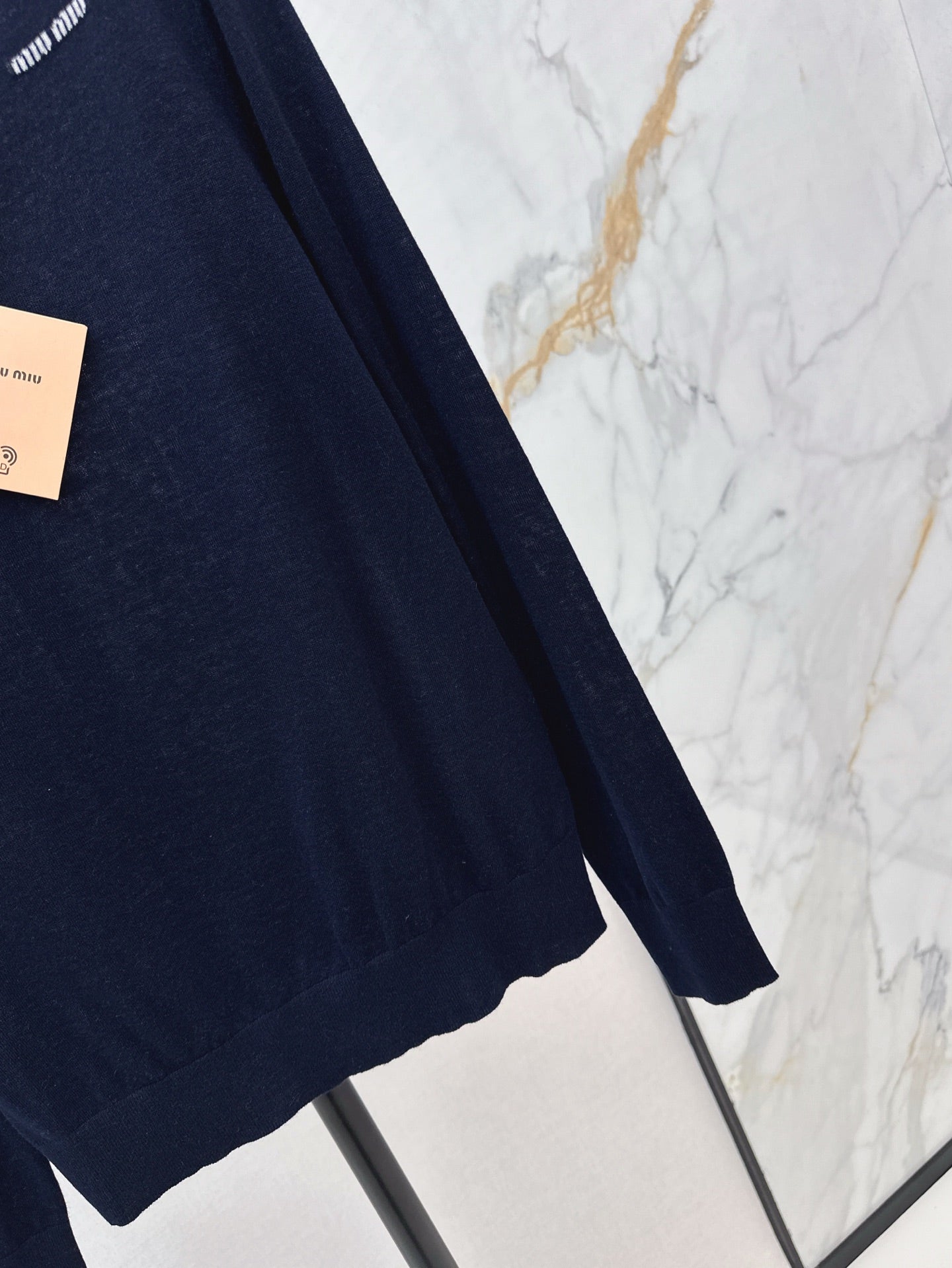 miu 25ss off neck sweater