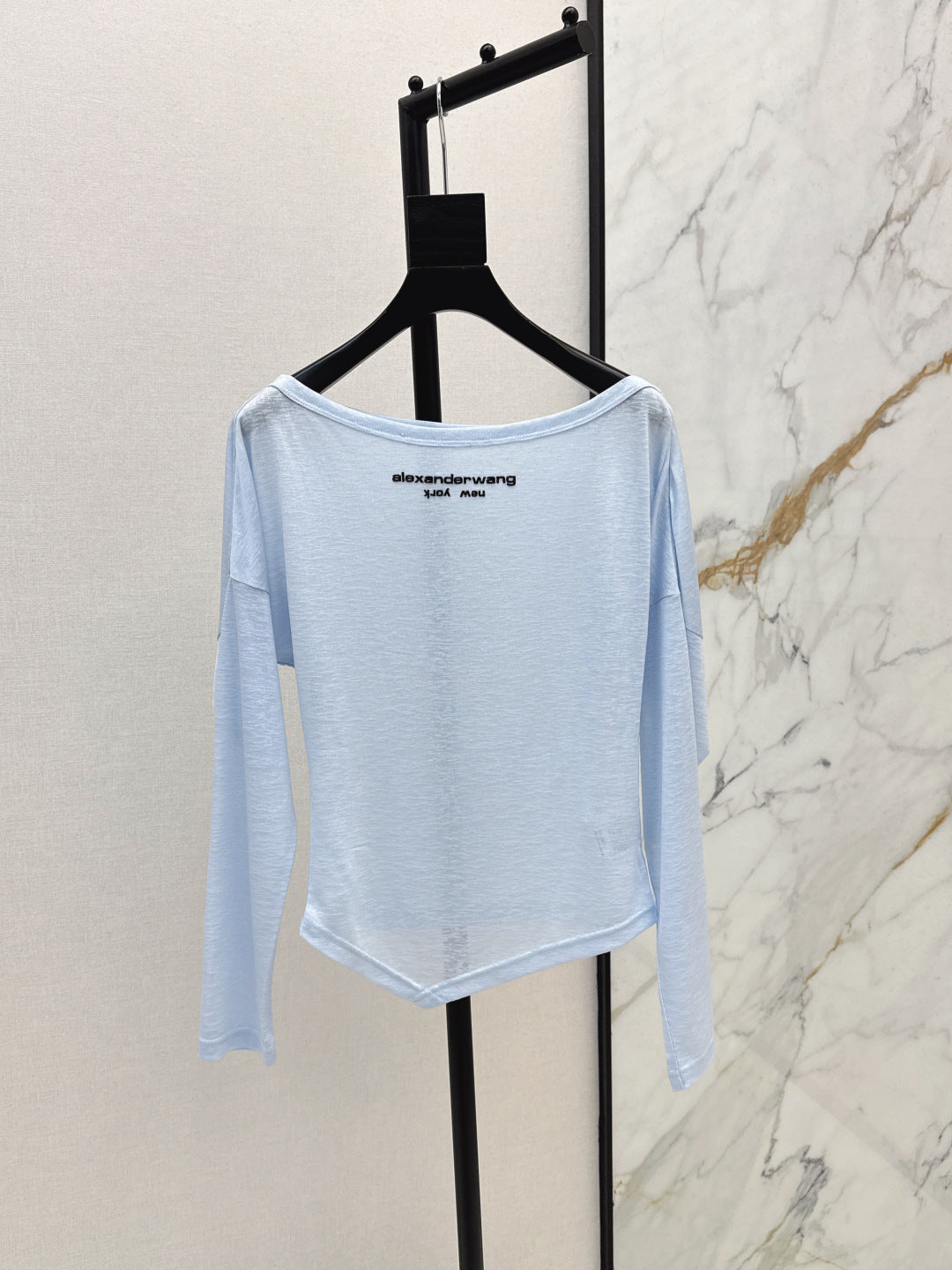 Wang 25ss off-shoulder shirt
