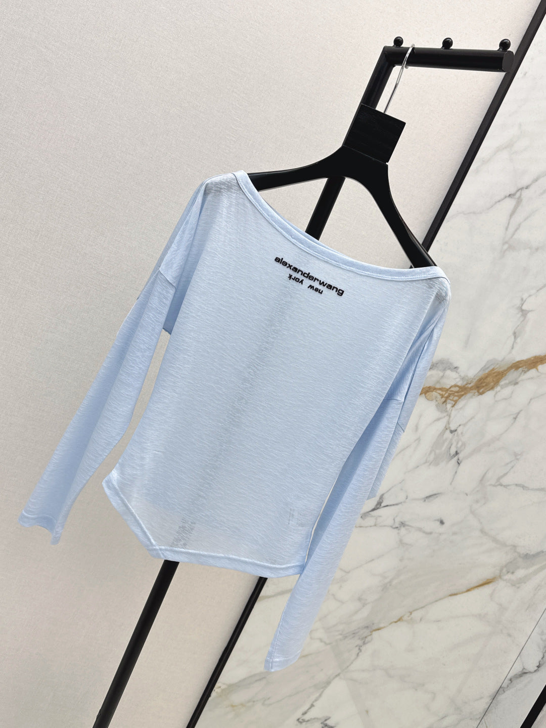 Wang 25ss off-shoulder shirt