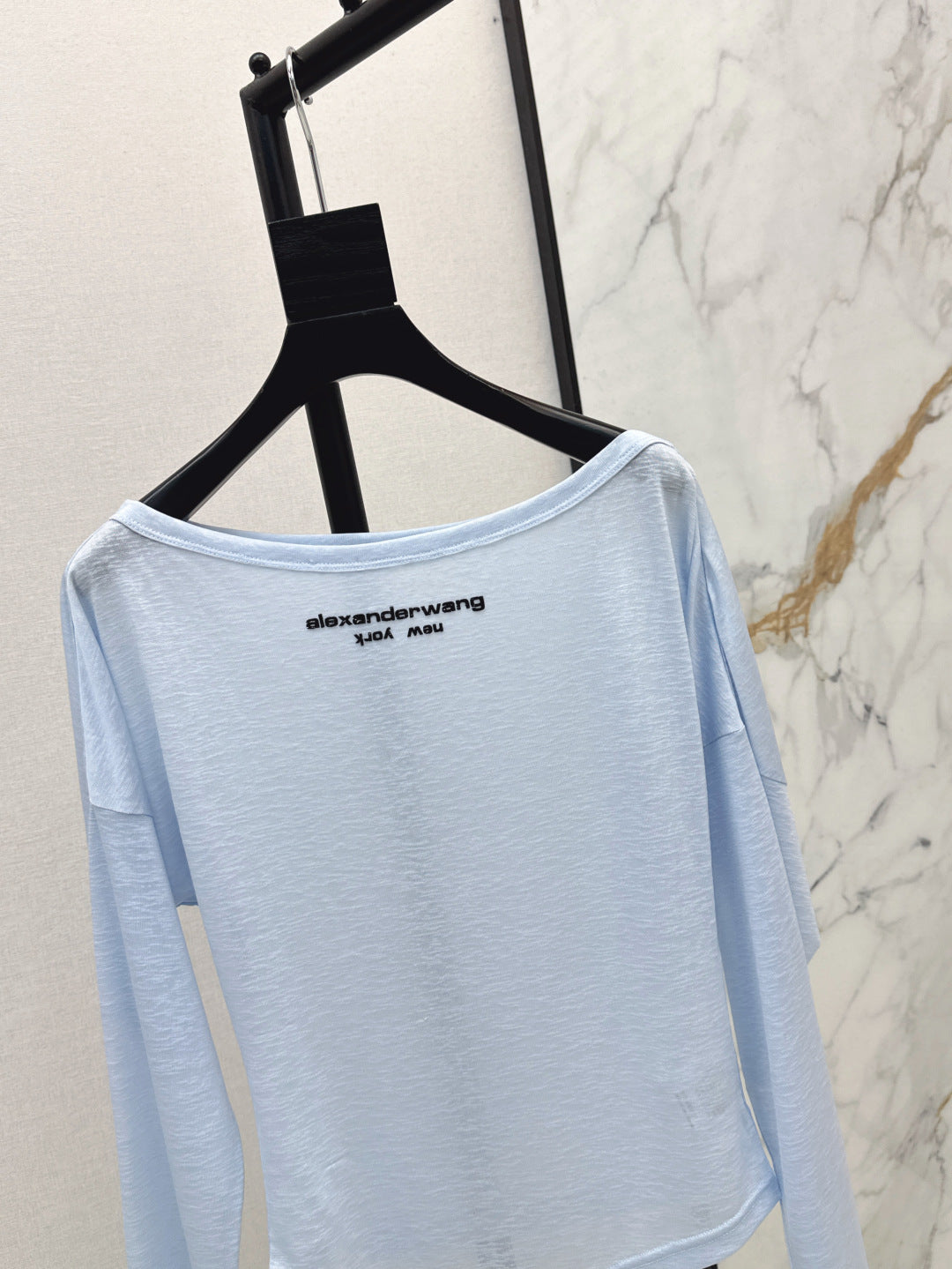 Wang 25ss off-shoulder shirt