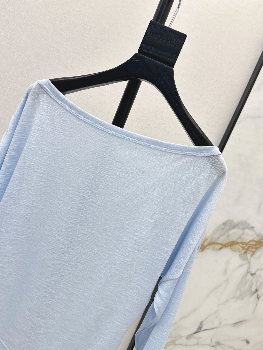 Wang 25ss off-shoulder shirt