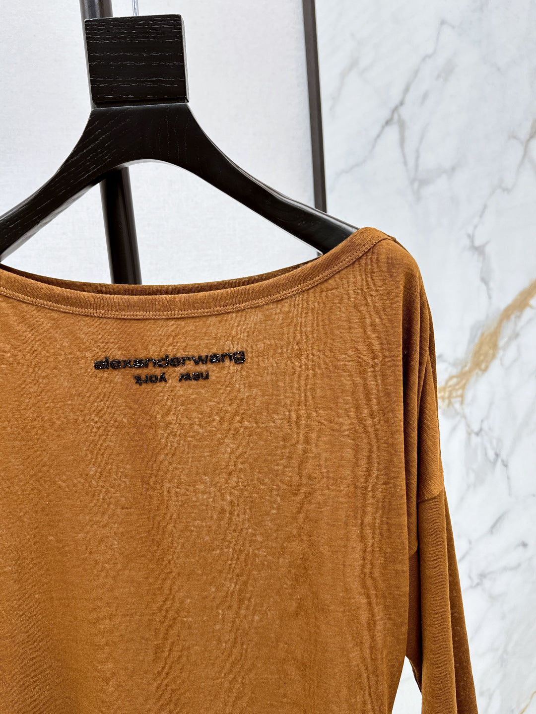 Wang 25ss off-shoulder shirt