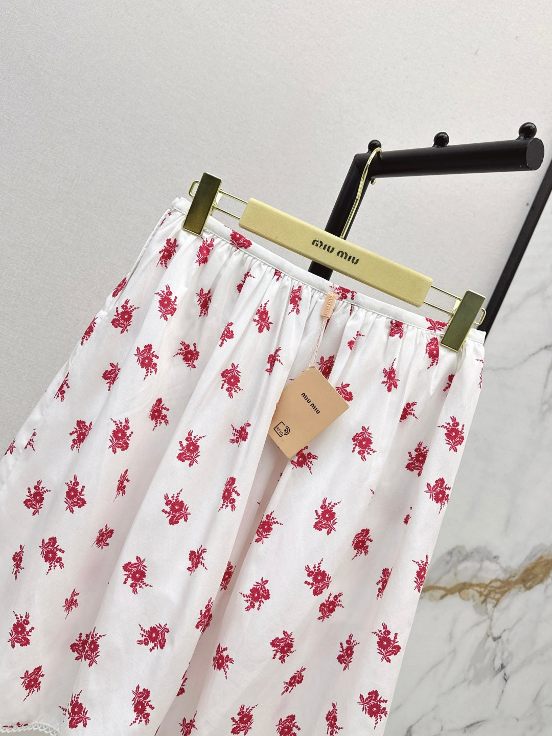 Miu 25ss print skirt