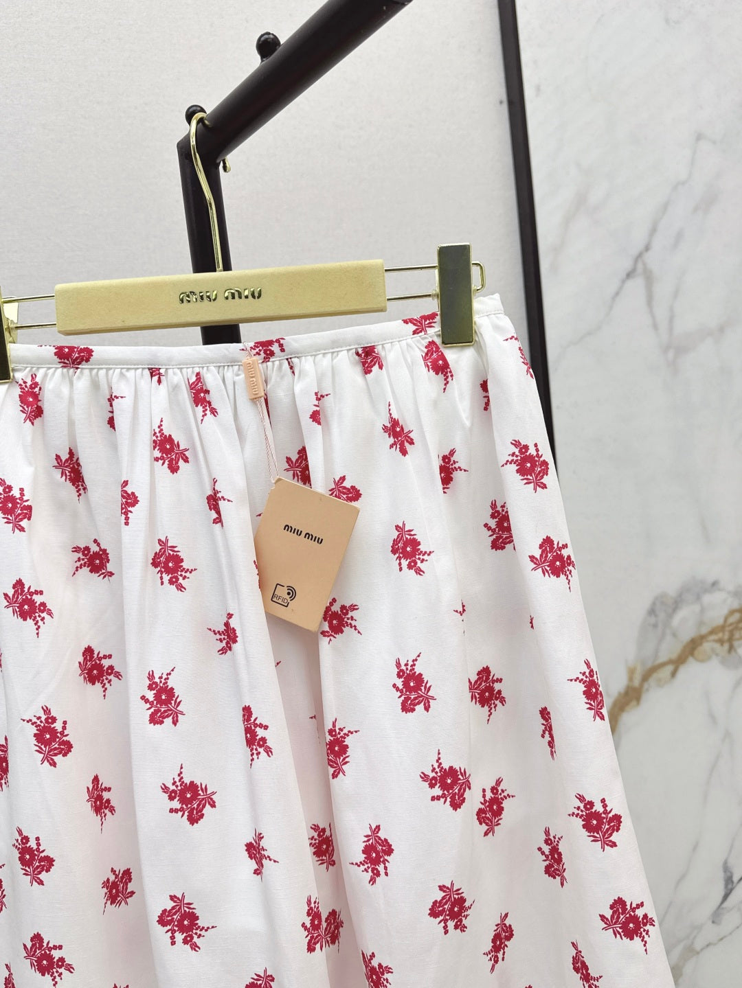 Miu 25ss print skirt