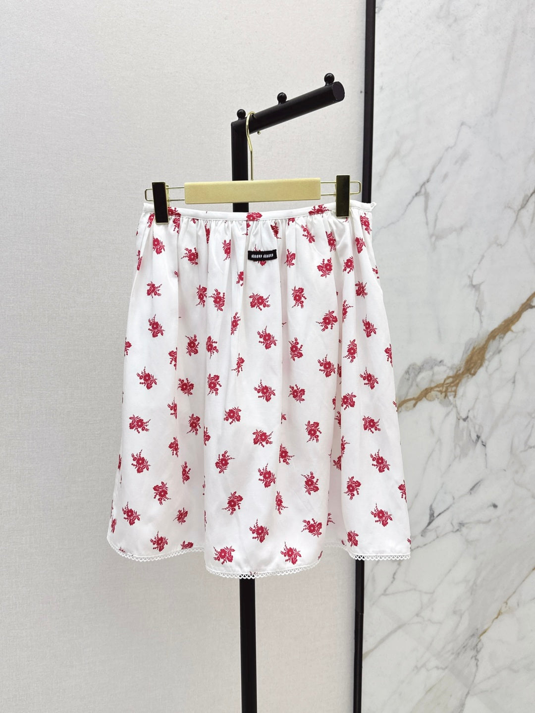 Miu 25ss print skirt