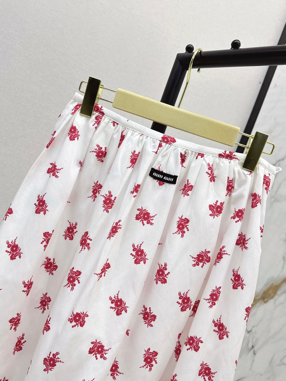 Miu 25ss print skirt