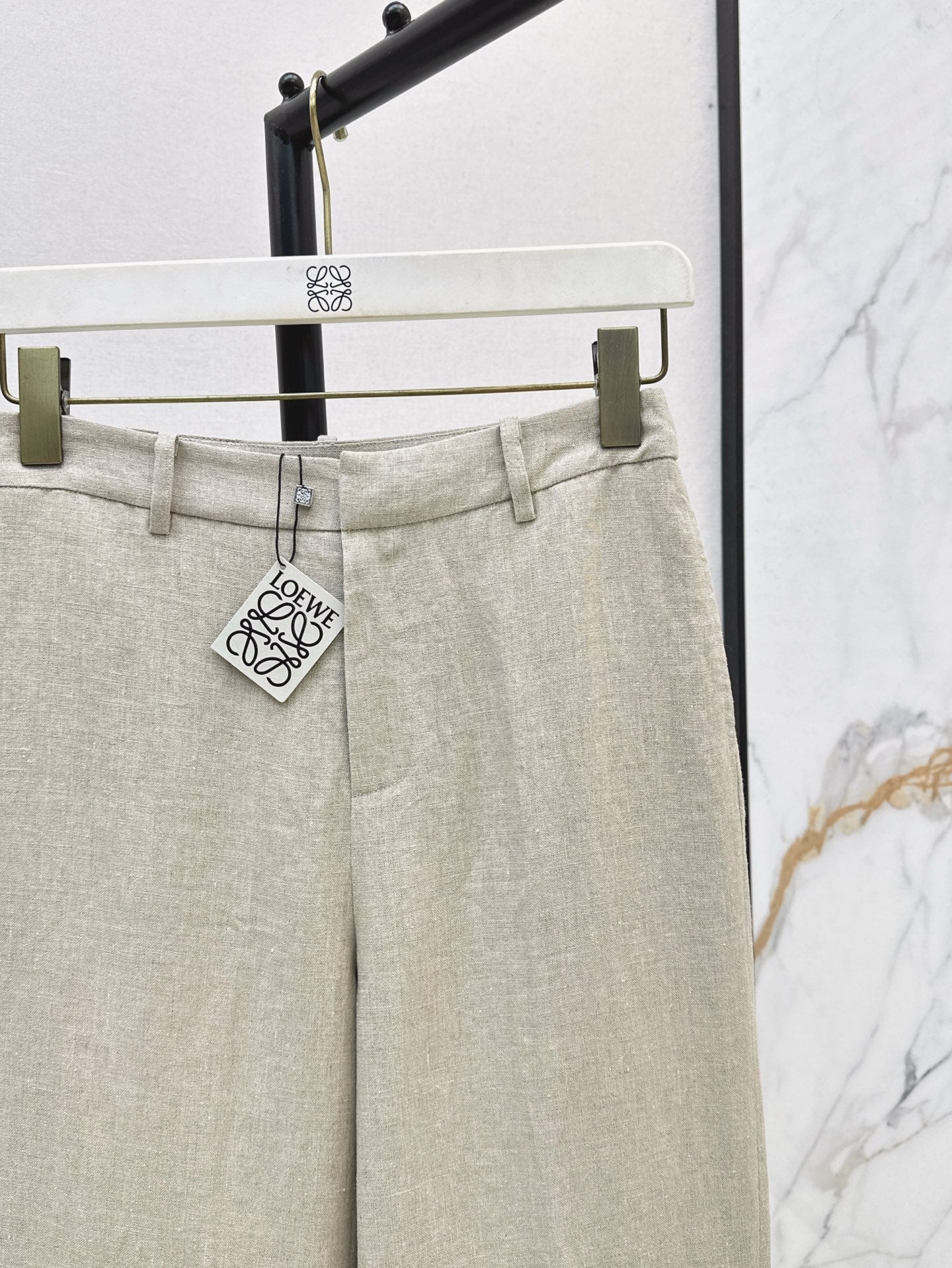 Loe 25ss Linen rolled-up pants