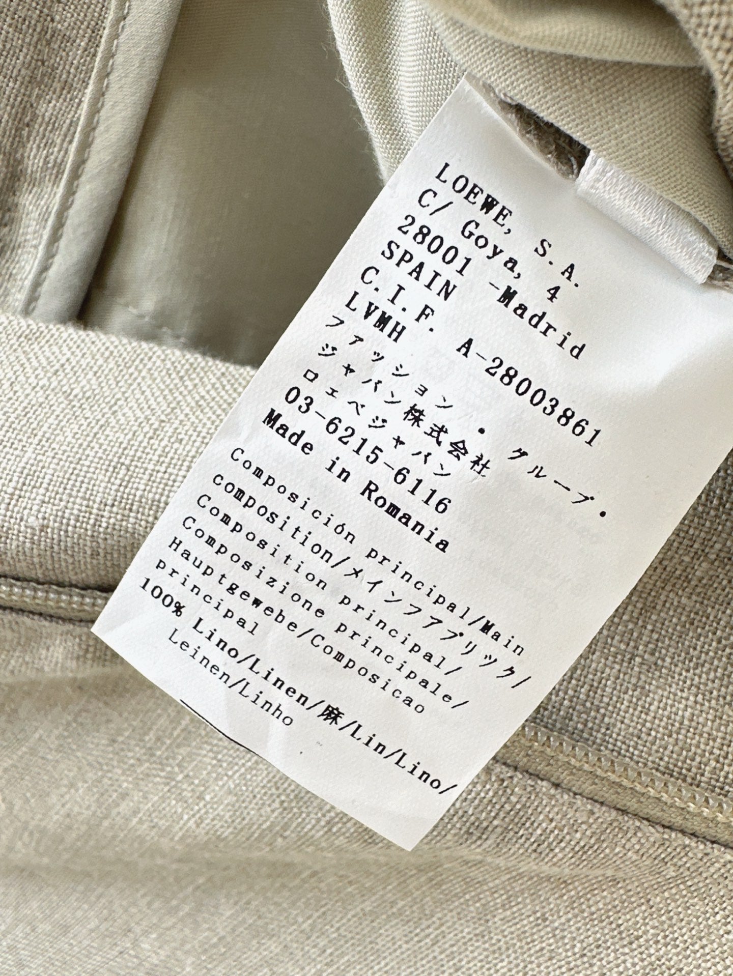 Loe 25ss Linen rolled-up pants