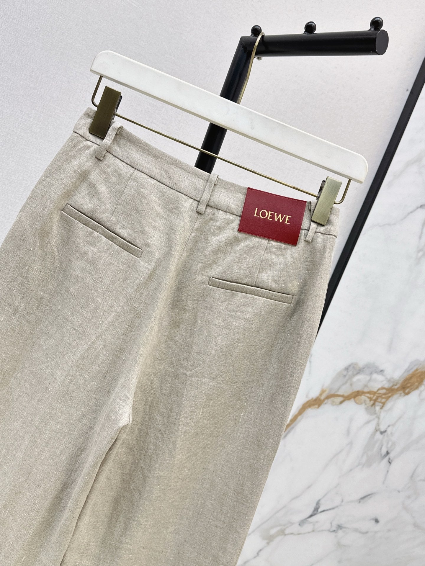 Loe 25ss Linen rolled-up pants