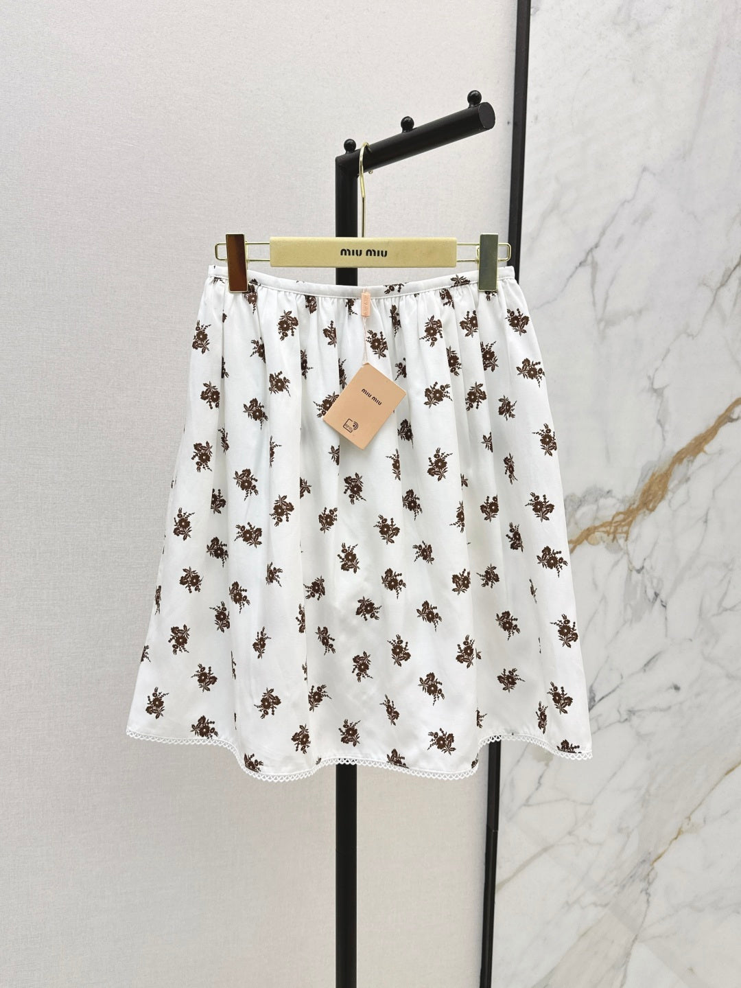Miu 25ss print skirt
