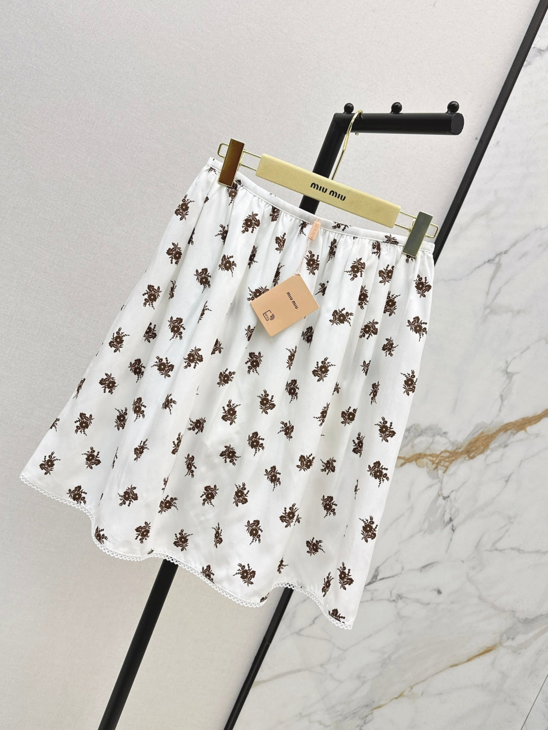 Miu 25ss print skirt