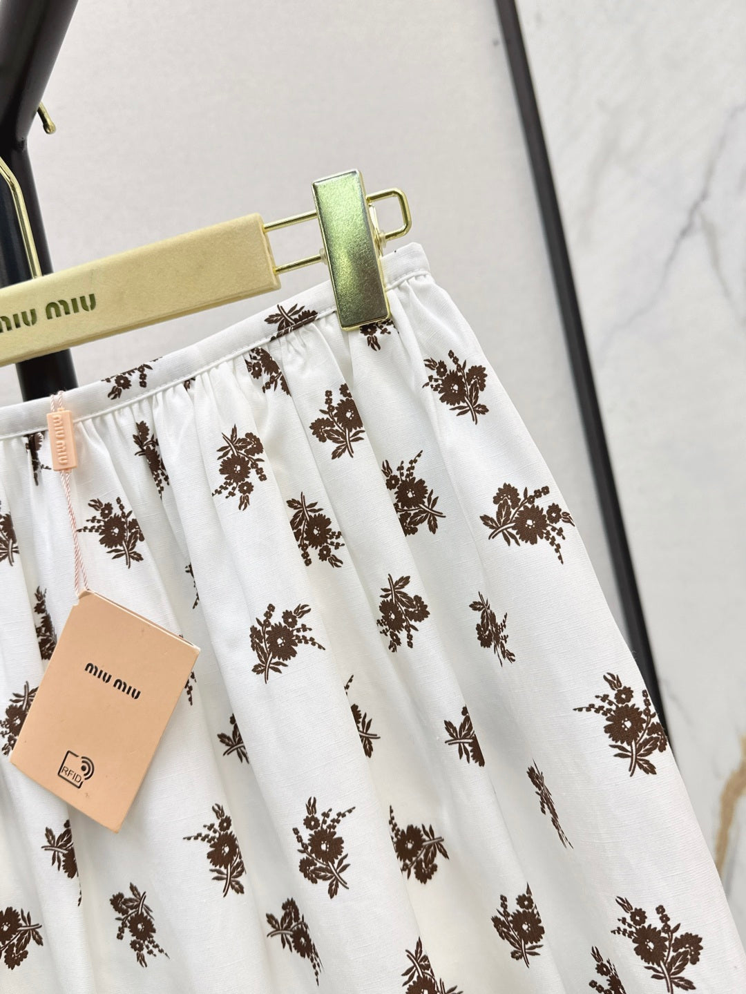 Miu 25ss print skirt