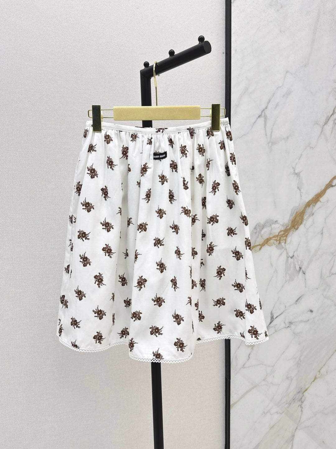 Miu 25ss print skirt
