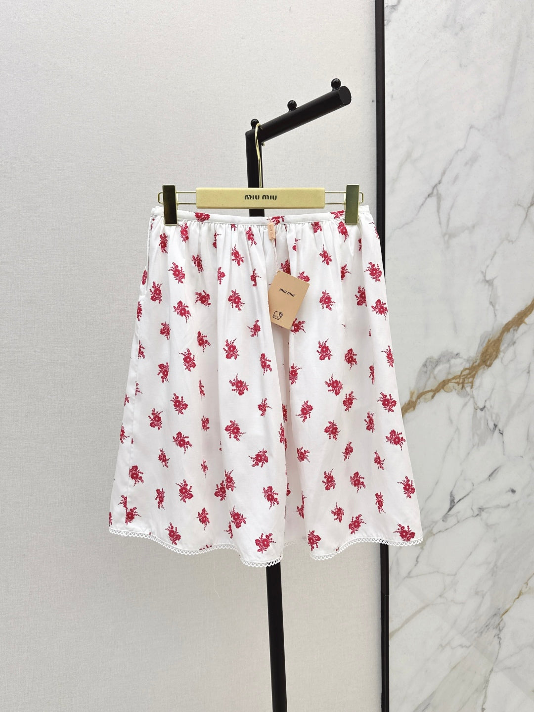 Miu 25ss print skirt