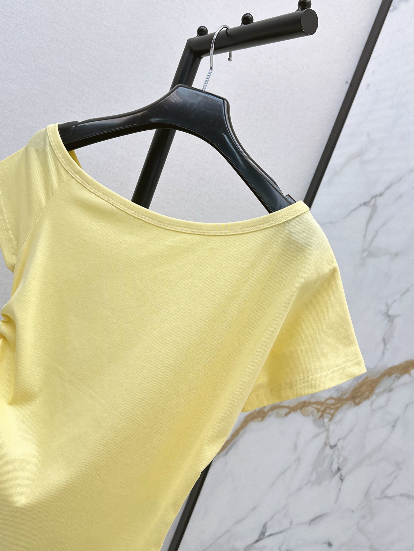 Saint lau 25ss off-shoulder shirt